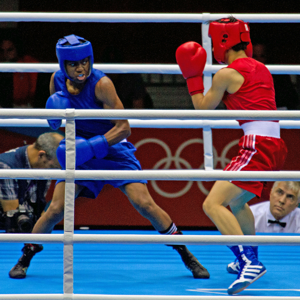 Nicola Adams claims Victory after beating Michaela Walsh