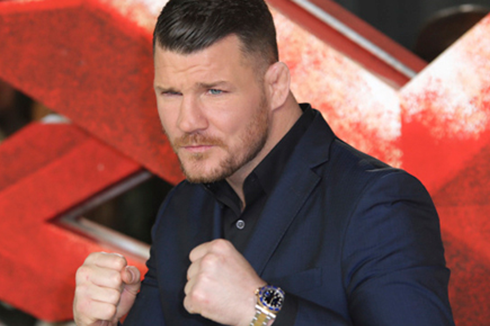 Michael Bisping News- Knee Surgery will sideline the champ Michael Bisping posing, Bisping vs GSP