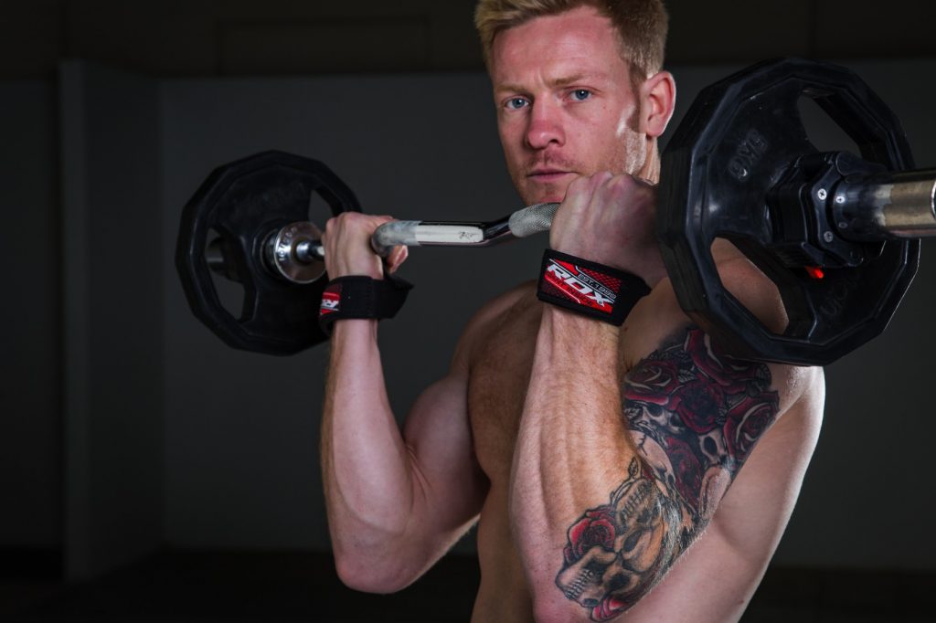 Man holding the dumbbells