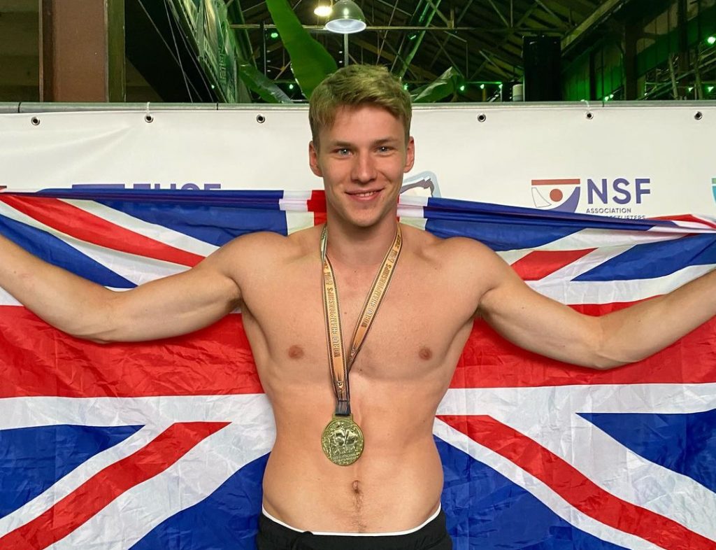 Alex Cowling with his country flag