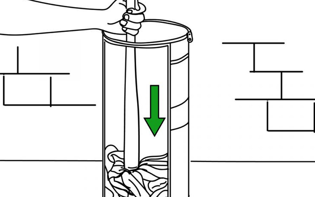 Filling A Punching Bag With Old Clothes