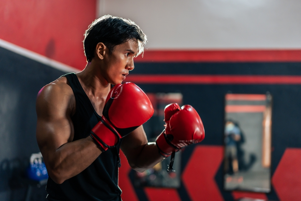 Mastering Your Boxing Skills: The Importance of Using Boxing Gloves & Pads Mastering Your Boxing Skills