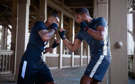 two boxers are sparring